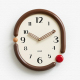 Horloge Murale Ovale Décorative Silencieuse À Quartz Avec Aiguilles En Noyer Et Design 3D 31 x 37 cm